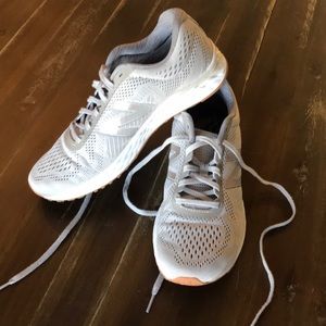 Grey New Balance tennis shoes